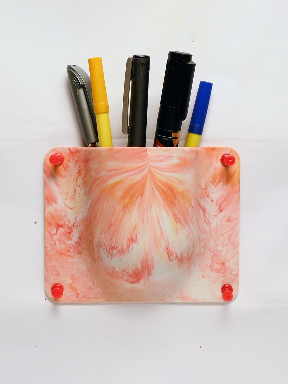 front view of wall mounted holder made from recycled plastic durable eco friendly storage solution for homes and offices