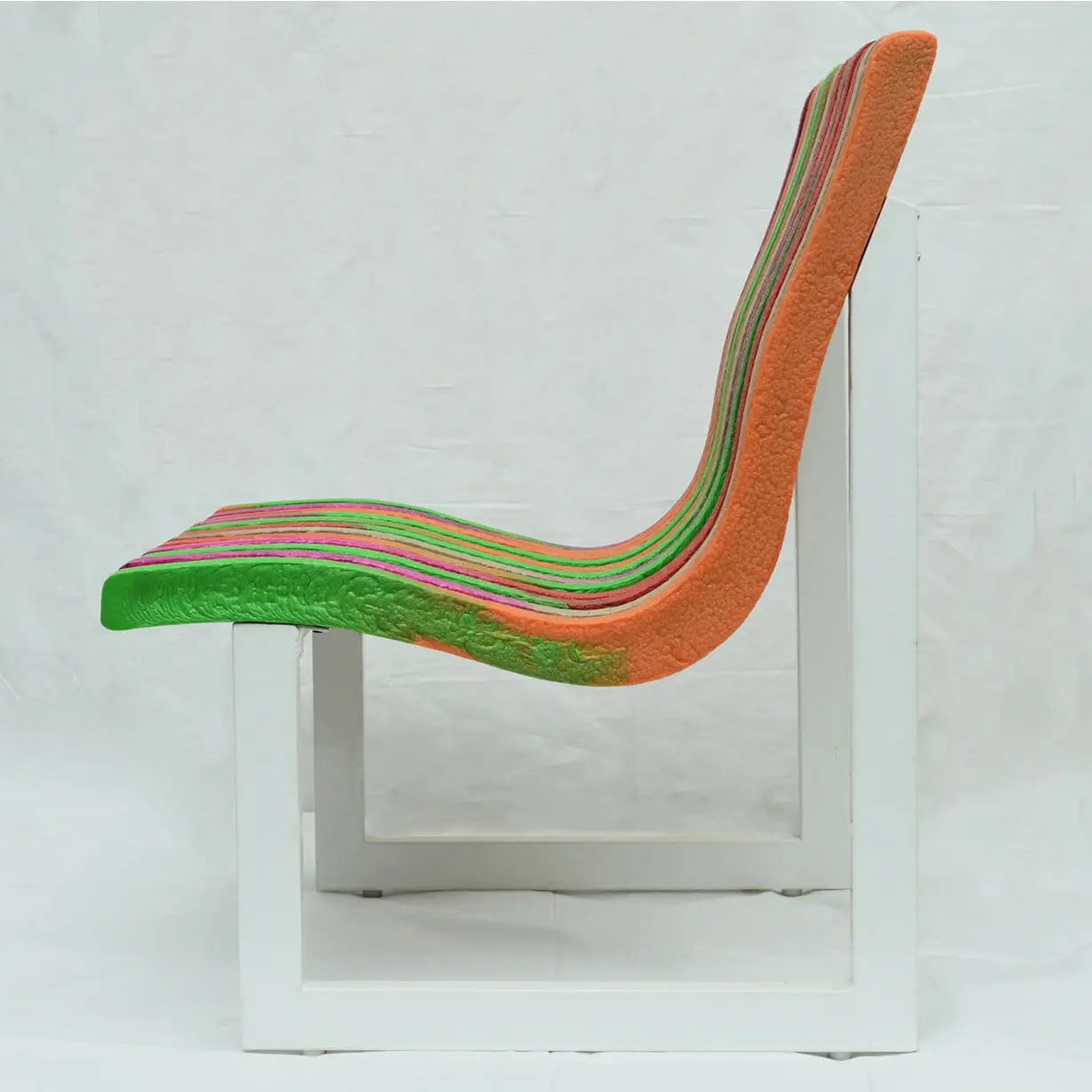 Side View of Durable lounge chair crafted from 100% recycled plastic sustainable outdoor furniture.